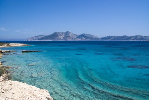 The beautiful Greek island of Koufonissi.  Crystal clear calm waters with a view to the island of Keros, which has an Minoan archealogical site.