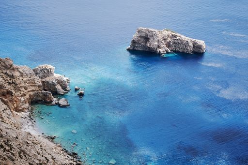 A beautiful shot of Agia Anna in Amorgos Island, Greece under a blue sky