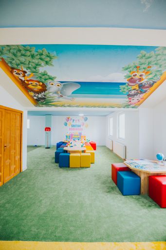 A wide shot of the playground area at a daycare center