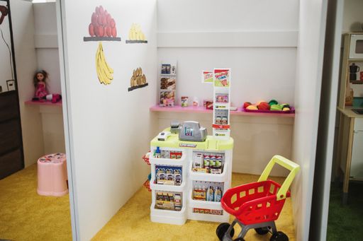 A wide shot of boys and girls playground area at a daycare center