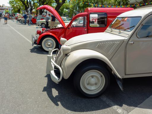 nose of an old popular beige Citroen 2CV 1950s. Side view. Expo Warnes 2021 classic car show. Copyspace