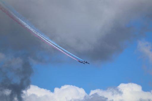 Patriots Jet Team performs with red, white, and blue trails during San Francisco's Fleet Week.