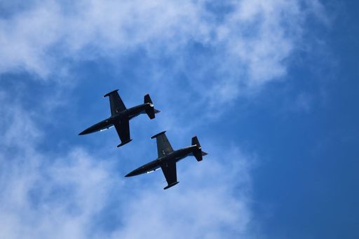 Two jets flying over San Francisco Bay during Fleet Week