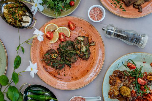 A top view of assorted food set on a table in the restaurant