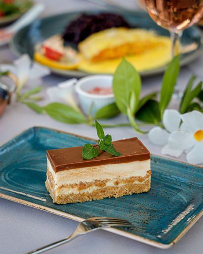 A piece of tasty cake on the blue plate