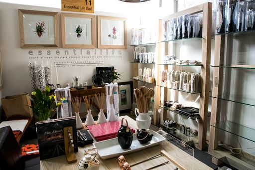 Different handmade items on display at an exhibition stand at handmade design fair