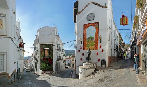 Alora, Andalucia, Spain: narrow alleys in a hillside white village, with christmas decoration
