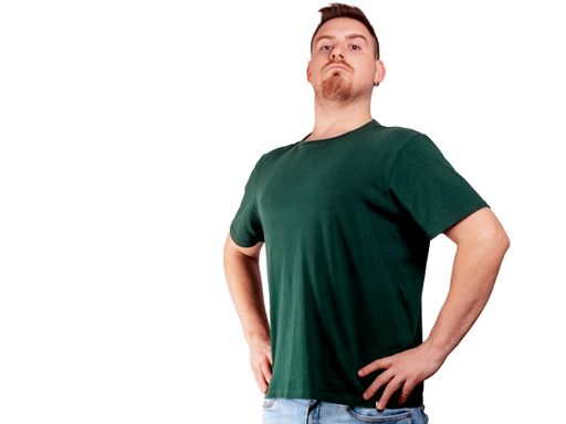 A Caucasian male standing proudly against a white background
