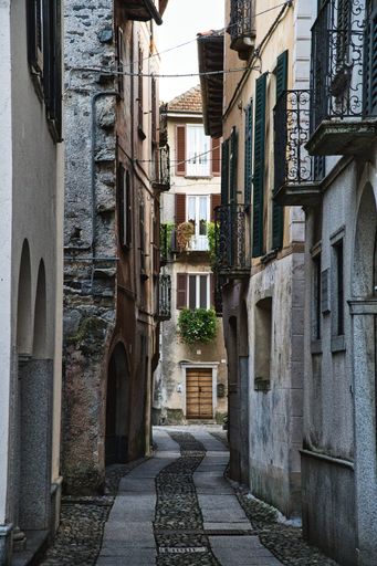 A vertical shot of an alley on the San Giulio island in Piedmont, Italy