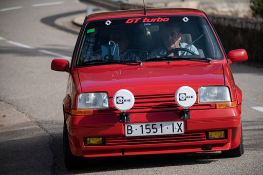 A man driving Renault 5 GT Turbo Rallye on a highway in Catalonia, Spain