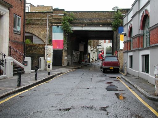 A traditional old London street with brick walls