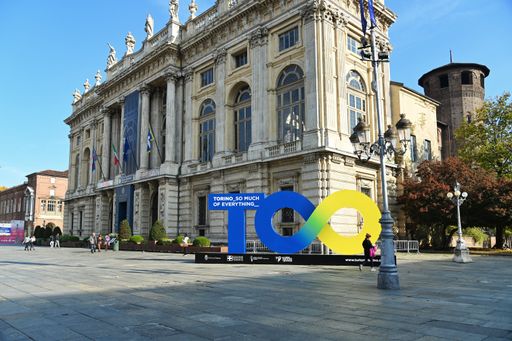A huge billboard and fan village in the square for the oncoming Nitto ATP finals tournament, Turin
