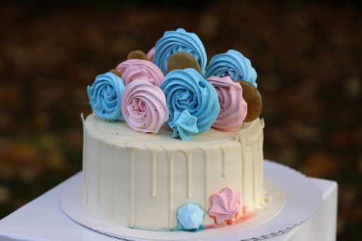 A holiday cake in blue pink colors for a gender revelation party