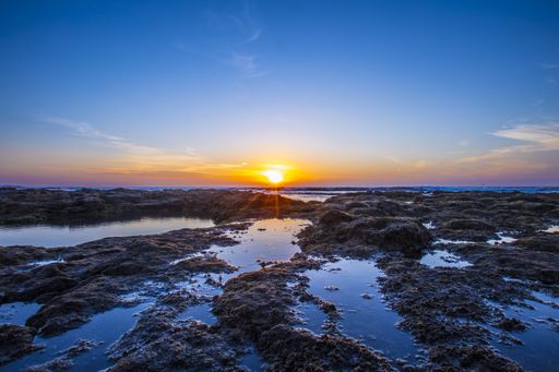 A breathtaking scenery of sunset over Salinas del Janubio on the island of Lanzarote, Canary Islands, Spain