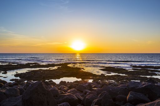 A breathtaking scenery of sunset over Salinas del Janubio on the island of Lanzarote, Canary Islands, Spain