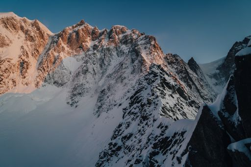 Alpine peaks, Aiguille du Midi and other famous alpine mountains. Alpinism, climbing, glaciers and snow.
