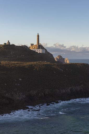 A vertical shot of Cape Vilan lighthouse at Galicia, Spain