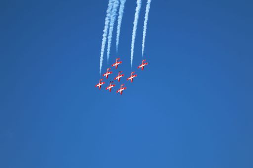 Canadian Snowbirds perform aerial loops with smoke trails at San Francisco Fleet Week