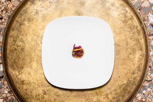 A closeup shot of a delicious vegan dishes on a white plate with beautiful presentation