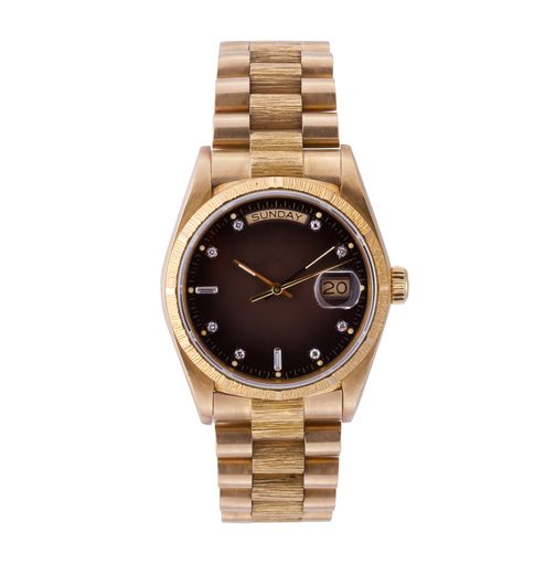 A closeup shot of a stylish golden watch on a white background