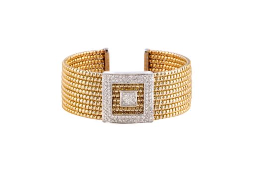 A closeup shot of an elegant bangle bracelet isolated on a white background