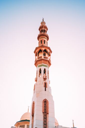 A vertical low angle shot of the Minaret of a mosque in Abu Dhabi