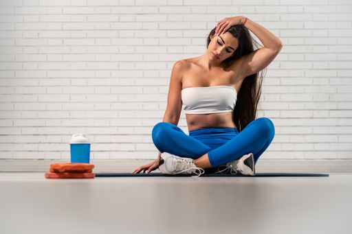An attractive Caucasian woman from Spain doing fitness session and stretching