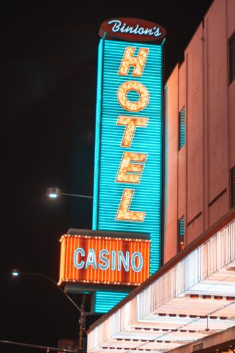 A vertical shot of neon casino and hotel sign in Las Vegas