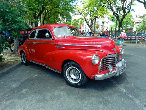 vintage stylish red Chevrolet Chevy Stylemaster 1946-1948 sedan two door built by General Motors. Expo Warnes 2021 classic car show.