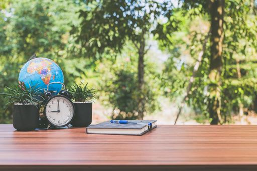 A notebook and office atmosphere with green background in the park