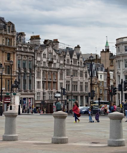 The Three stone bollards and old buildings in Trafalgar Square, London