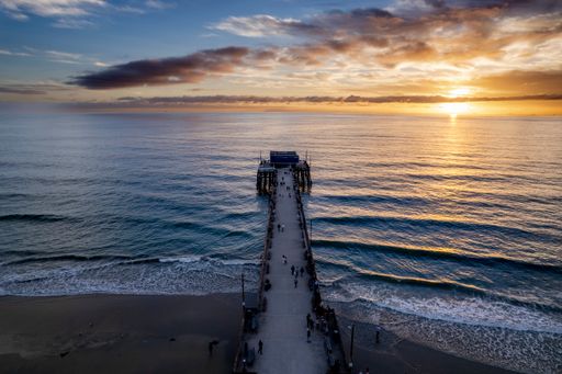 A scenic view of the pier at Newport Beach at sunset, California, USA