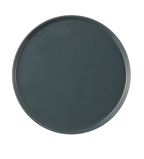 An overhead shot of a ceramic plate on an isolated background