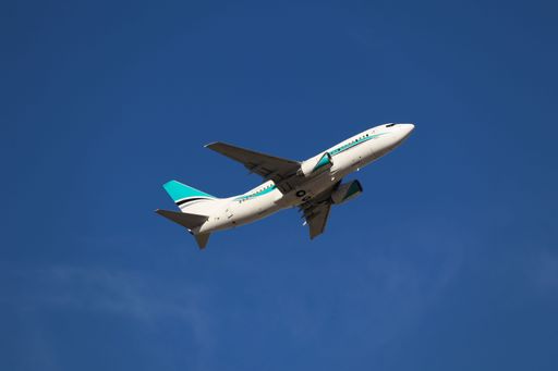 A Kaiser Air Boeing 737-700 takes off from San Jose Airport to Seattle Boeing Field.