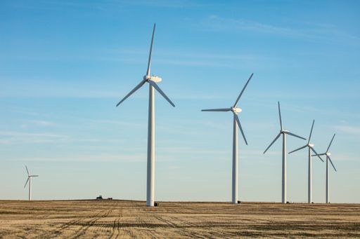 A row of windmills at a wind farm in Northern Colorado