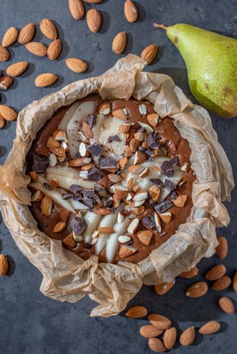 A top view of a delicious homemade chocolate almond cake on a table