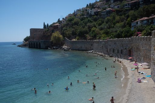 An aerial view of a group of people on the beach in Alanya, Turkey