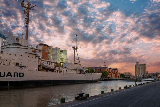 The USCGC Taney WHEC-37 coast guard ship along the riverfront in Baltimore Maryland USA