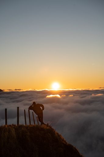 A sunset over clouds at Mount Niederbauen in Switzerland