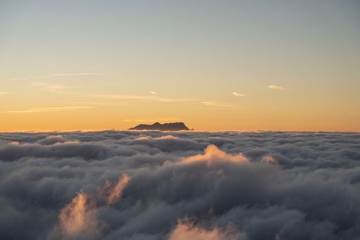 A sunset over clouds at Mount Niederbauen in Switzerland