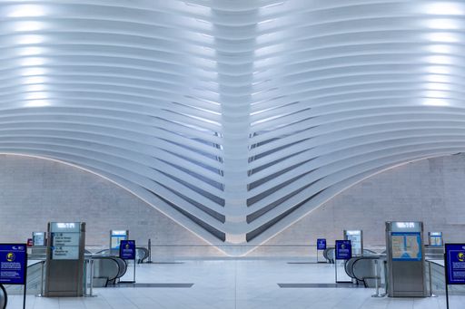 large atrium with white arches resembling a skeleton of a whale or dinosaur