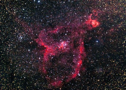 A sky with dense stars seen from a telescope