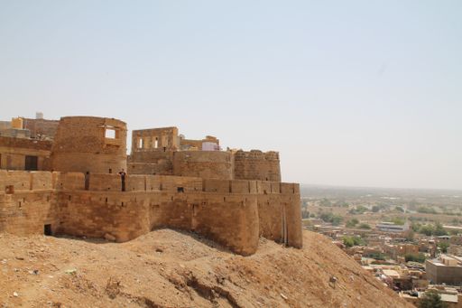 A beautiful shot of a mud brick building during the day