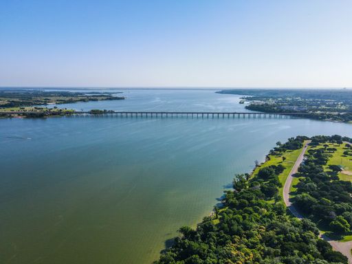The beautiful aerial view of a bridge over Lake Waco in Texas