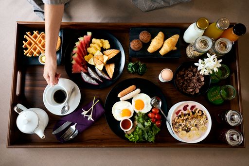 A top view of a continental breakfast on a big tray