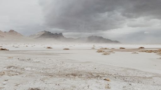 A beautiful view of Bonneville Salt Flats in Utah under a gloomy sky