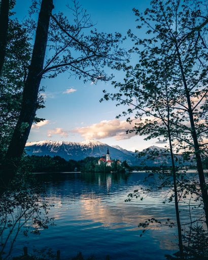 A vertical shot of Assumption of Maria Church. Catholic church in Bled, Slovenia.