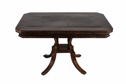 A small old wooden table under the lights isolated on a white background