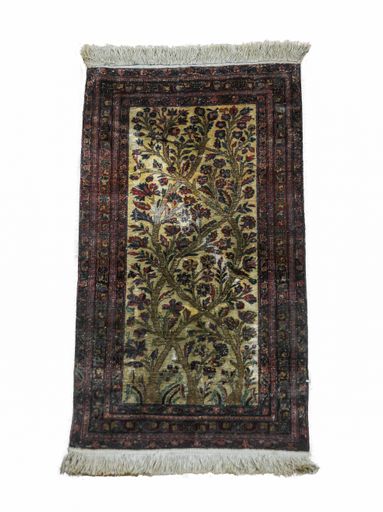 A vertical shot of an old carpet under the lights isolated on a white background
