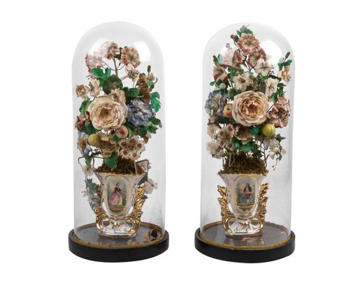 The two vases with decorative flowers isolated on the white background